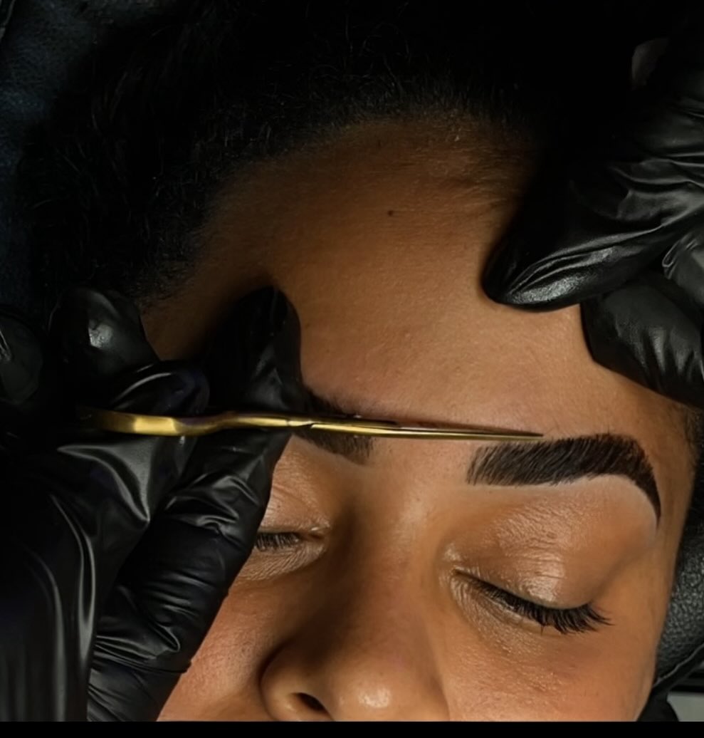 Model showcasing perfectly shaped brows and lashes